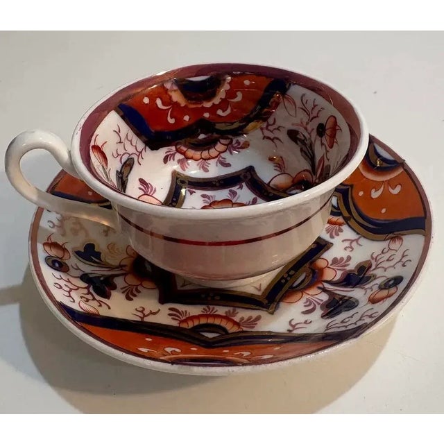 A beautiful pair of early 19th century Gaudy Welsh cup and saucers. The saucers measures 5.5 inches in diameter and the...