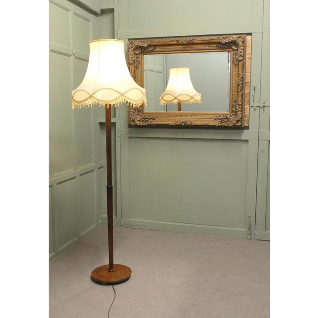 Tall Floor Lamp, Standard Lamp The central column stands on a turned chunky wooden base, the lamp is in good condition,...