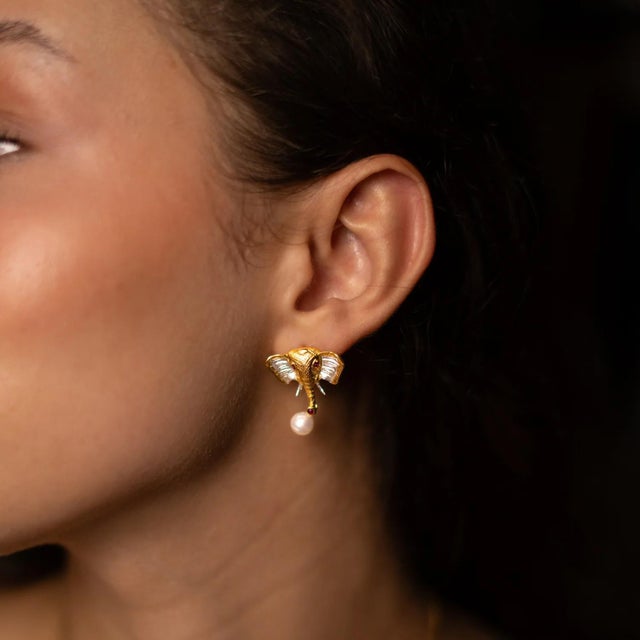 Embrace strength, wisdom, and protection with our Guardian Elephant Ruby & Pearl Earrings. Handcrafted on sterling silver...