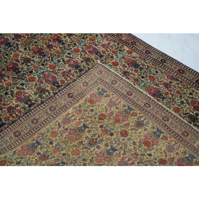 The classic Zil-i-Sultan ("Shadow of the Sultan") design of eight offset rows of flower vases and paired birds is set on...