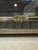 Elegant vintage Gucci photo frame crafted in a polished silver-tone metal with gold-tone bamboo-inspired trim accents. The...