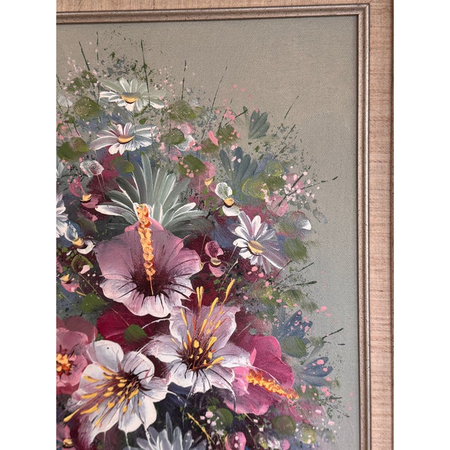 Presenting a vintage decorative arts studio floral oil on canvas with silver-champagne tone frame and linen matte. All of...