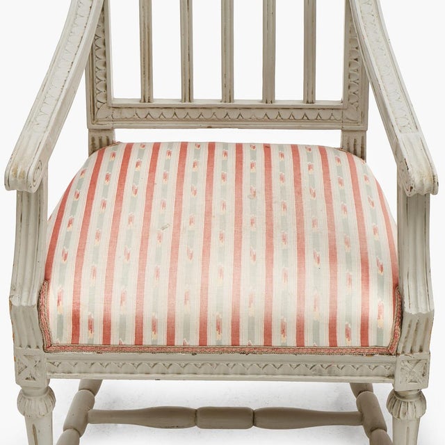 A distinguished set of four authentic Swedish Late Gustavian armchairs crafted in the renowned Lindome tradition, dating...