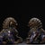 This is a striking pair of vintage cloisonné enamel guardian lions, also known as Foo Dogs or scholar's desk lions. Each...