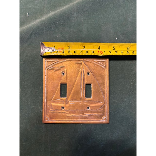 Brass sailboat light cover. This is real brass.