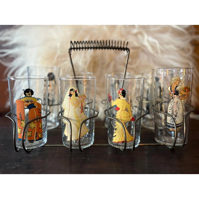 These are a rare find as a full set with their original caddy. Two of these tumblers are not original to the set and are...