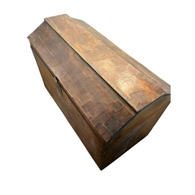 A striking, early 19th-century French Provincial blanket chest, hand-hewn from solid wood and rich with timeworn...