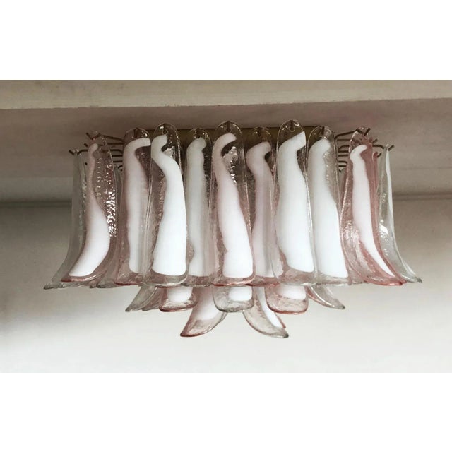 This ceiling lamp has 64 Murano Glasses. The glasses have two different colors, half are transparent with white spots,...