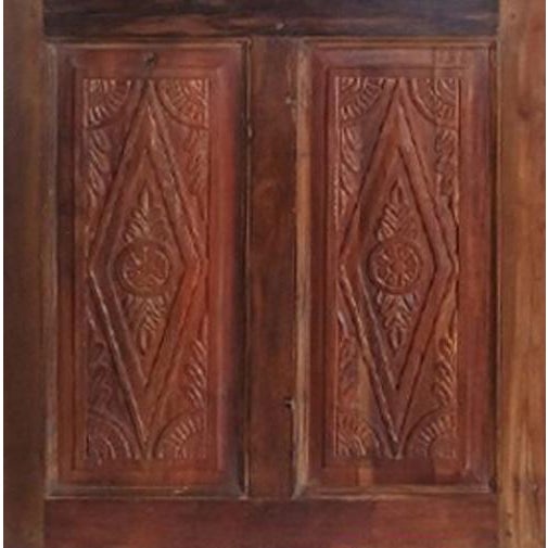 These vintage hand-carved barn doors showcase exquisite floral detailing carved into richly grained natural wood,...