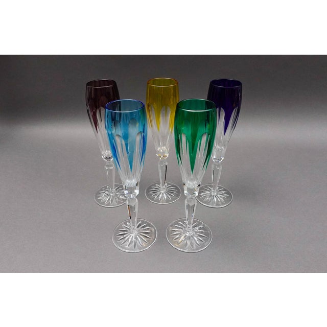 Faberge Crystal Lausanne Multicolored Champagne Flute Glasses Set Of 5. Measures approximately 1 7/8" long, 9" high.