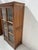 Pair of elegant display cabinets in solid cherry wood. They open with two doors, each with six clear glass panes. Three...
