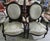 Pair of Napoleon III period armchairs in ebonized wood, circa 1850 Decorated with carvings Fine silk upholstery Cabriole legs