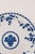 Antique Minton Delft round serving platter featuring a classic blue and white transferware design with a scalloped rim....