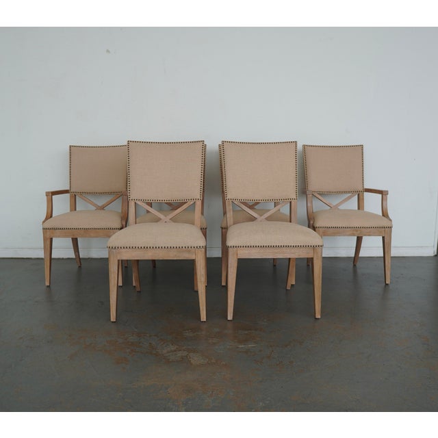 The ideal pairing of comfort and design, these dining chairs feature an upholstered back with a contemporary X-back lumbar...