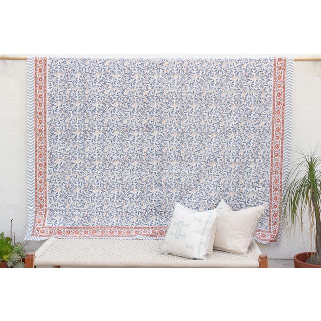 Drift into dreams with the serene beauty of our light Indian coverlet, a charming centerpiece for your bedroom decor....