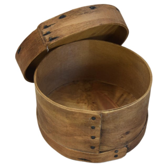 A graduated stack of 3 primitive vintage bentwood pantry boxes (often called Shaker-style pantry boxes or wooden cheese...