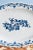 This 18th-century French faience dish from Strasbourg is decorated in blue and white with a lush spray of scrolls and...