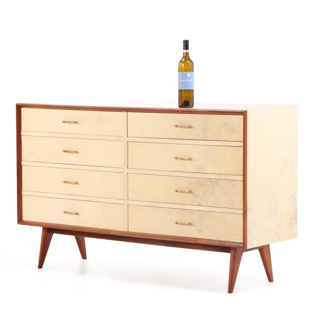 This commode is a beautiful example of mid-century storage systems. With a defined mahogany trim and classic tapered legs,...