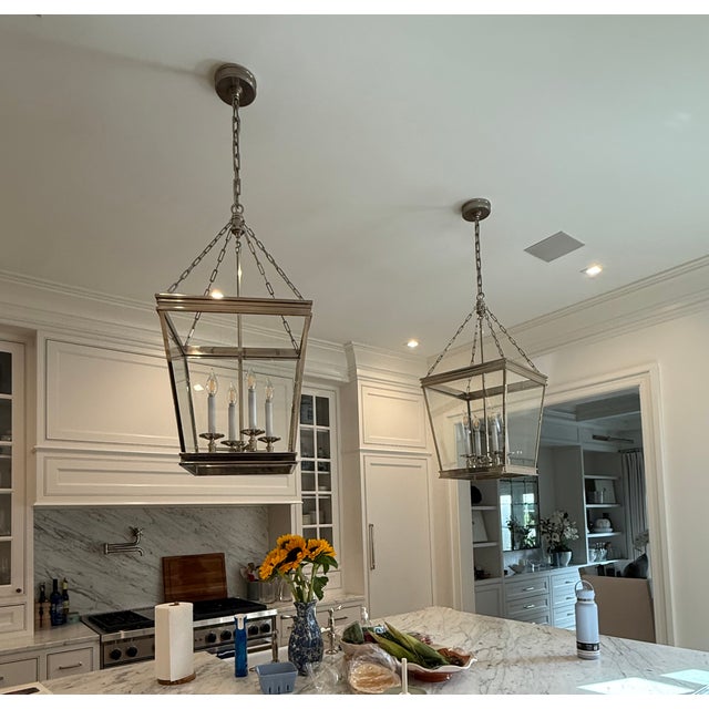 A stunning pair of designer lantern pendants from Visual Comfort’s Signature Collection, designed by Chapman & Myers....