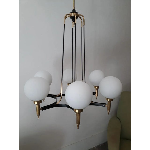 Mid-Century Modern 6-Light Pendant Lamp from Stilnovo, in Restored conditions. Designed 1960 to 1969 This piece is...