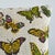 This pillow features Butterfly Epingle with a knife edge finish. A ’70s-fabulous handstitched pillow inspired this...