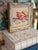Charming vintage needlepoint featuring a beautifully stitched seashell in warm shades of coral, rust, cream, and soft...