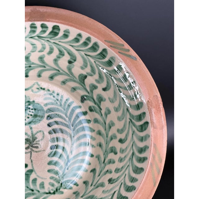 Large Spanish handmade and painted white and green glazed terracotta "Lebrillo" earthenware bowl in the style typical of...