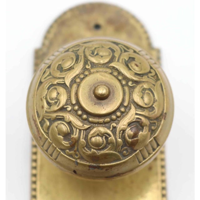 Victorian style dummy door knob set made of brass with a mixed polished and brushed finish. The door knob was made by...