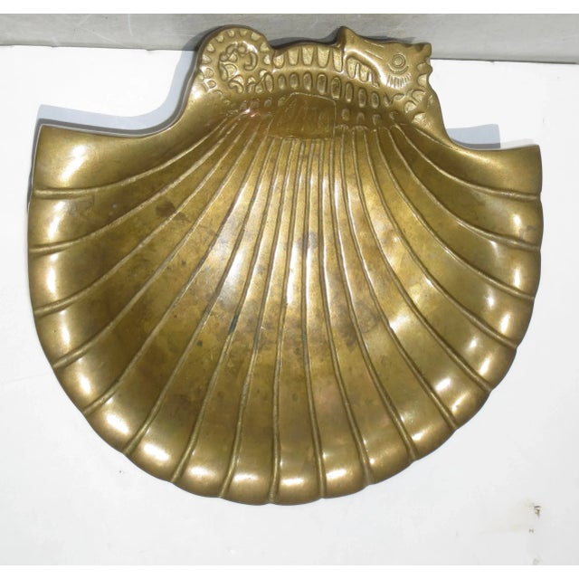 Beautiful bronze shell formed tray with a seahorse handle. Crafted in the art deco form with angular and geometrical...