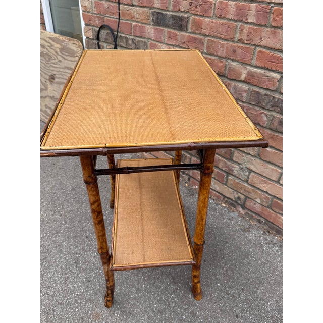 This is a beautiful 19th century English bamboo side table! Tables like these make excellent accent pieces because their...