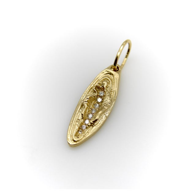 When we found a vintage charm in the shape of a vulva, we thought it was the perfect symbol of empowerment and decided to...