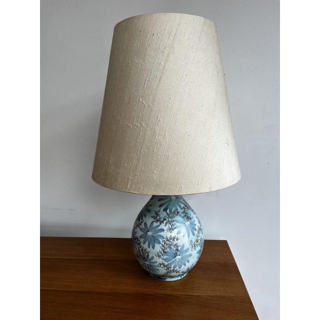 What a beauty! Hand-painted ceramic, soft tones, and just enough character to bring calm to a space. Origin: Germany...