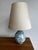 What a beauty! Hand-painted ceramic, soft tones, and just enough character to bring calm to a space. Origin: Germany...
