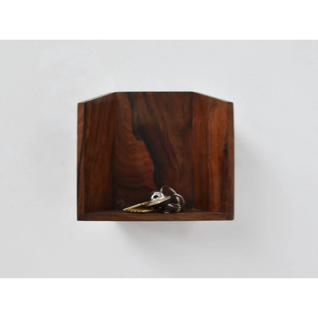 Danish Suspended Pocket Emptiers in Rosewood, 1960, in Very Good conditions. Designed 1960 to 1969