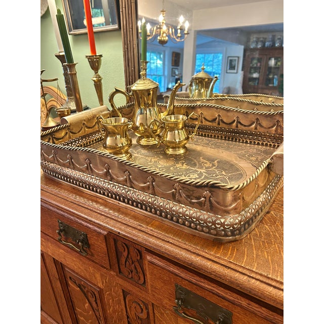 This large brass tray was produced for Castilian Imports, an American importer known for decorative metalware and...