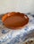 Hand painted lacquer scalloped tray in soft pumpkin orange. 15” x 2” Tray is sturdy bamboo and adds a fashionable pop of...