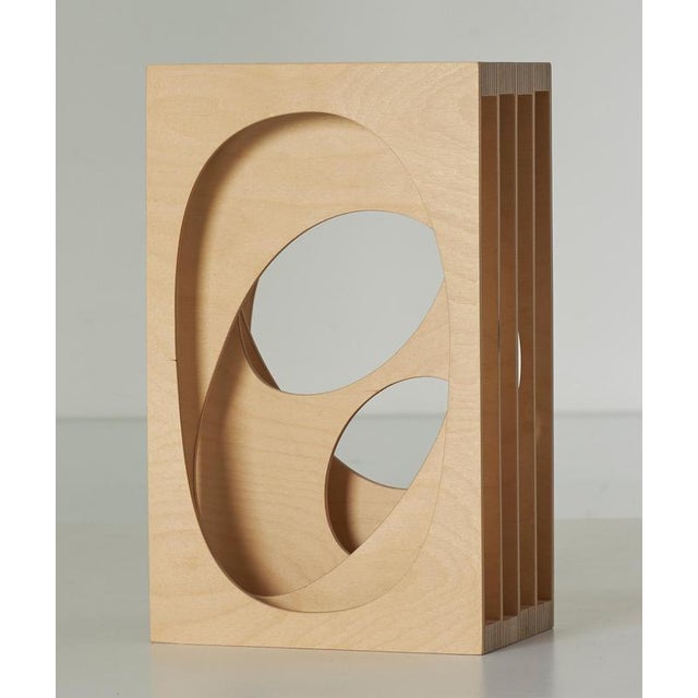 Tall fluid cube series 11 wall sculpture in birch plywood by a hint of neon. Limited edition of 7 pieces. Signed and...