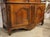 Hand-carved circa 1780, this walnut buffet deux corps has motifs associated with both the Louis XV and Louis XVI periods,...