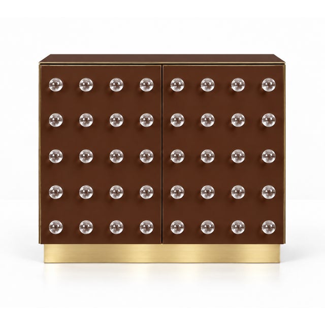 An italian contemporary cabinet made to order in a deep chocolate-brown finish, with 90 clear murano glass spheres across...