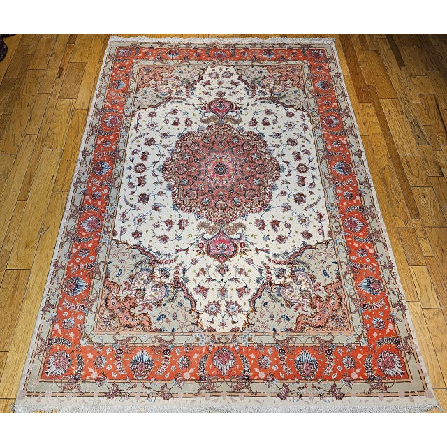 "This finely knotted vintage Persian Tabriz rug, dating from the third quarter of the 20th century, is a stunning example...