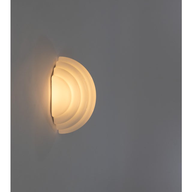 Kumo ceiling or wall lamp designed by Kazuhide Takahama and produced by Sirrah in 1985. The model consists of an opaline...