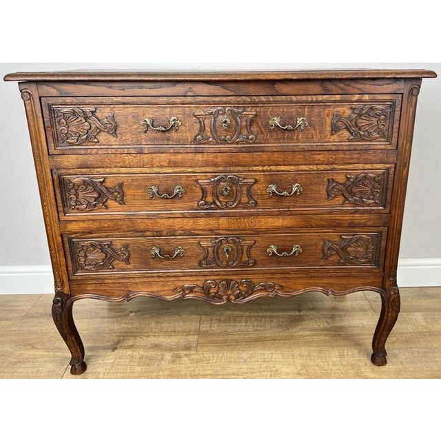 Add timeless French elegance to your home with this Vintage French Louis Chest of Drawers , beautifully crafted in oak and...