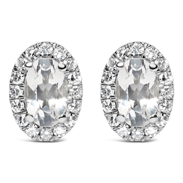 10K White Gold 5x3 MM Oval White Topaz and Diamond Halo Stud Earrings (I-J Color, I1-I2 Clarity) For Sale