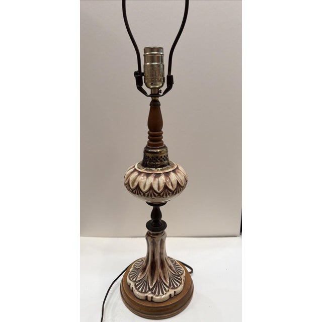 Vintage 1970s Mediterranean / Spanish Revival ceramic table lamp featuring sculptural molded detailing, rich brown...