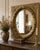 An elegant French Louis XVI style wall mirror dating from the early 20th century, remarkable for the richness of its...