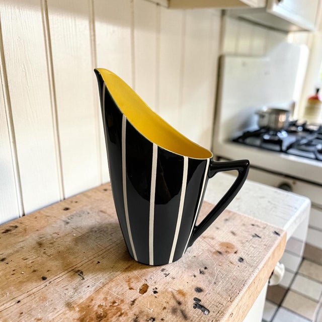 Elevate your kitchenware collection with the Vintage Hornsea John Clappison Tall Jug, featuring a striking black and white...