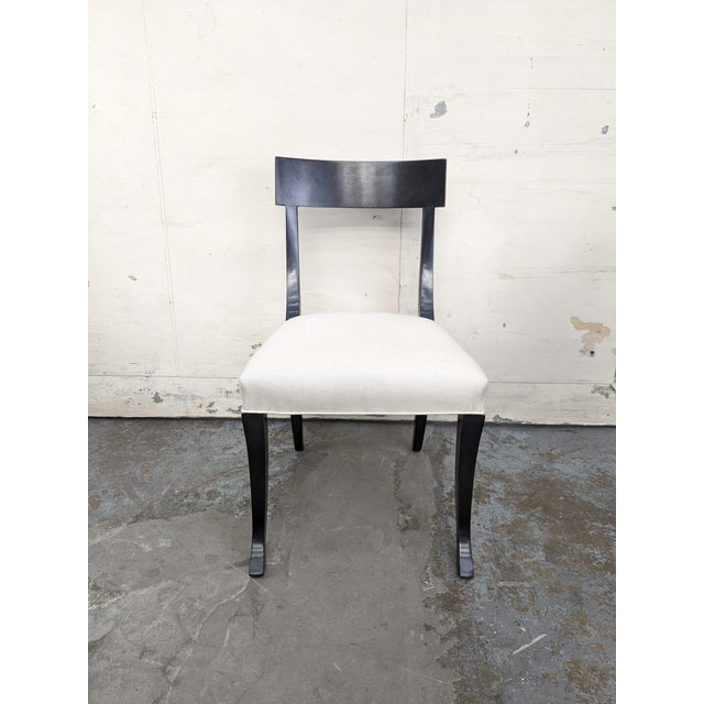 Grace Klismos side chair. Dark stained maple legs and frame. Atil - Seal upholstery by the Romo Group.