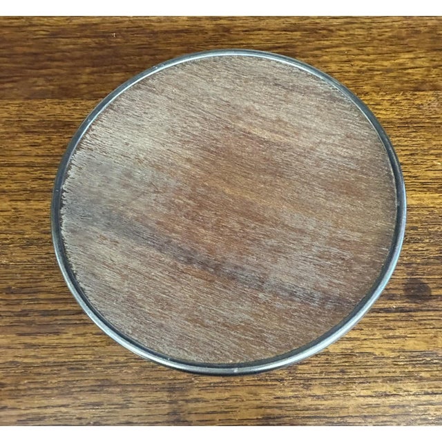 Available for purchase is an elegant vintage wine bottle coaster by William Adams & Company, a Towle-associated...