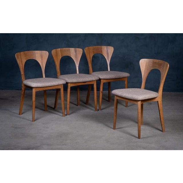 Single dining chair, model Peter, designed by Niels Koefoed and produced in Denmark in the 1970s. A sleek and timeless...