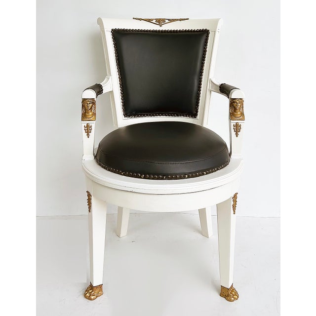 1850s French Empire Armchairs, Fine Gilt Bronze Mounts, Painted and Upholstered Offered for sale is an original pair of...